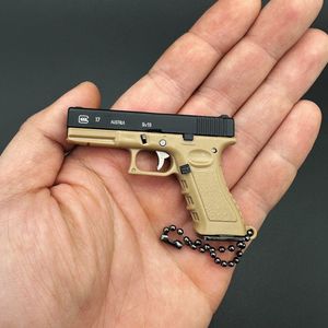 Novos brinquedos de pistolas de pinças de pingentes de pingentes de atacado G17 Gun Keyring Bag Acessórios Modelo Toy Gun Gun Miniatura Coleção