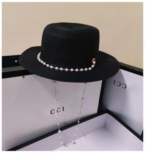 Breda brimhattar 2021 Sun Hat For Women Straw Flat Top Pearl Chain Fedoras Ladys Summer Cap Visors Elegant Vintage9397895