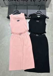 Frauen Sportbekleidung Designer zweiteiliger Buchstaben drucken navelisexy Tanktop T-Shirt Kurzrock Casual Anzug Rundes Nacken-Outfit Solid Color Anzug