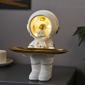 Obiekty dekoracyjne figurki kreatywne astronauta posąg statua magazynowa Nordic Decor Decor Decor Desk Storage Astronaut Figurine Tabil do salonu wystrój Klucz magazyn T240505