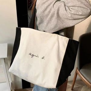 Bolsas de noite do Japão Comércio Exterior Exportação única ab preto e branco dois lados simples de grande capacidade de lona portátil bolsa de compras bolsa de compras