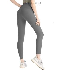 2023 pantaloni da yoga lu allineare leggings donne pantaloncini corti per pantaloni da signore pantaloni esercitati fitness indossare ragazze che corrono leggings palestra slim cot allinea pantaloni 998