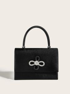 Сумочка женщин маленькие сумки вечерние сумочки бриллианты роскошные дизайнерские дизайнерские металлические кольцевые ручка блестящая хрустальная кошелька 240506