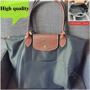 Combinente 2024 Capacidade de alta qualidade Bolsa barata lojas saccoche saco de atacado Hobo moda grande mulher branca mulher ombro de praia bolsa de bolsa de bolsa de maquiagem nylon e641