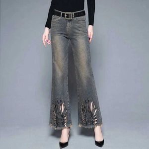 Kadın Pantolon Capris orijinal tasarım işlemeli kot pantolonlar yüksek bel sonbahar düğmesi cep fermuarı yıkanmış ağartılmış, eski gevşek düz parlama pantolon y240504
