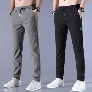 Męskie spodnie męskie jedwabny jedwab męski kolor stały kolor Mid talia luźna oddychająca prosta legalna krańca Spodnie cienkie szybkie suszenie Pocket Pocketsl2405