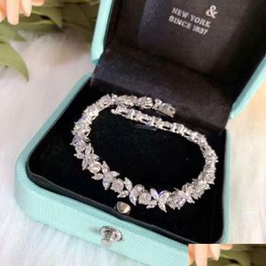 Braccialetti di fascino bracciale designer di lusso per donne a quattro foglie di moda alla moda elegante stringa di perline da gol di gioielli diamanti otikb