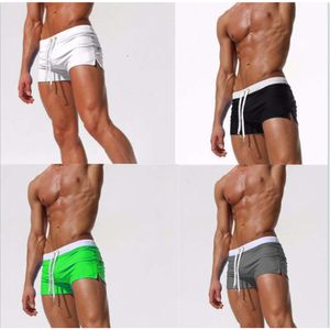 Men's Swimwear 2024 New Solid Color Mens Anti Awkwardness and Anti Light Shorts with Tied Tight Sports Quick Drying Pants