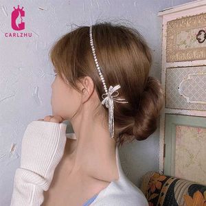 Pannband 2022 NYA RHINESTONE PAINBAND BOW CHAIN ​​TASSEL PEDANT HEADBAND WOMENS bröllop smycken Tillbehör Q240506