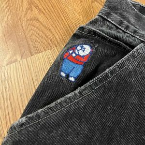 Calças masculinas Jeans Polar Big Boy Y2K Calças esportivas desenho animado de hip hop bordado bordado de bolso azul de jeans de moda de moda casual calçada