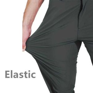 Mäns byxor vår och höstmens mens caiiawav elastiska snabbtorkningsbyxor med elastisk midjeband Y240506BTAC