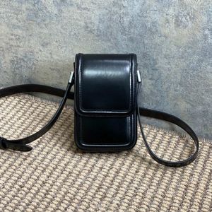 Fashionabla unisex mobiltelefonpåse ny kalvskinn crossbody väska kvinnor axelväskor lyxiga män designers väskor toppkvalitet designer hobo axelväska