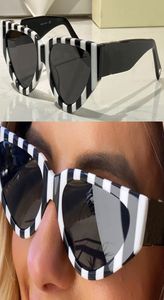 Óculos de sol de olho de gato feminino 4063 quadro de listras preto e branco moda moda estilo feminino compras viagens de férias de viagem 79299988