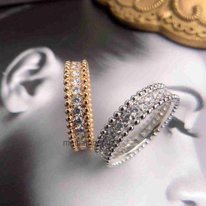 Projektant luksusowy pierścień biżuterii Vancllf High-end Clover 925 Pure Silver Flower Beads Pojedynczy wiersz Pełny diamentowy palec Crossing gruba złota moda osobista