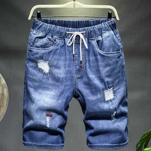 Мужские шорты мужские джинсовые шорты летние горячие плюс размером 10xl 7xl. Слух свободных эластичных джинсовых джинсов с высокой талией.