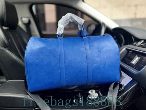 青いエンボス加工された50cmのダッフルバッグ高級ファッションメンズとレディースの旅行ダッフルバッグブランドトートバッグトップフィットネスハンドバッグロック大容量バッグ