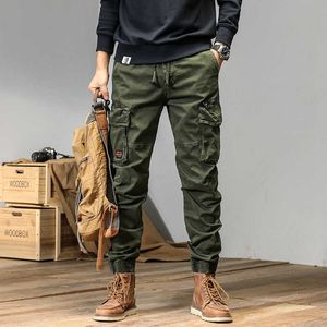 Men's Pants Mens slim tight fitting pleated and handheld jeans American multi bag pants outdoor vL2405