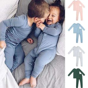 Pajamas 2024 New Convalials Bamboo Fiber Toddler Baby Babyrens Set for Girls Solid Long Sleeve Top+Pants Boys Sleepwear H240507