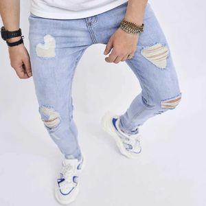 Jeans masculinos Men orifícios elegantes Lavar jeans skinny de moto