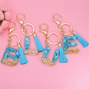 Keychains Lanyards Sequins Filled Resin English Letter Keychains Blue Tassel Pendant Bling Crystal Shiny Alphabet Keyring Bag Ornament Car Trinket