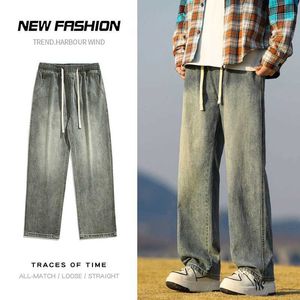 Herr jeans spring nya män överdimensionerade baggy jeans trend ins raka lös elastisk midja casual strtwear breda benbyxor man y240507