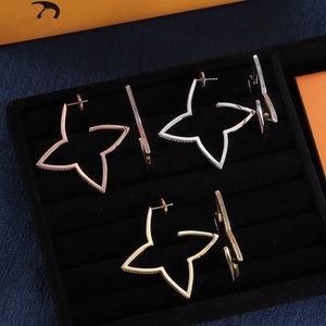 Mit Box Gold und Silberohrringen mit schönen und eleganten Designs für Frauenstud