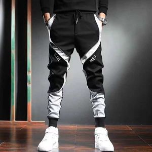 Calças masculinas Roupas clássicas de rua Hip-hop jogador masculino Fita de fita de fita de bolso de bolso casual calça esportiva K181L2405