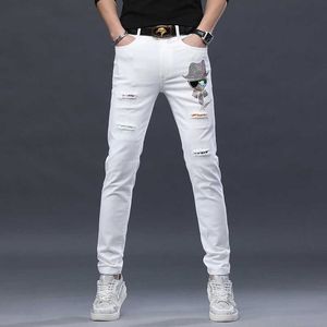 Mens 2023 Denim Pants Slim Fit Small Feet Trendy Brand Diamond Korean Version Perforated Elastic White Jeans Mens Clothing