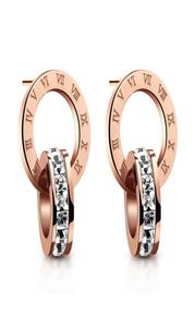 韓国のシンプルなローマのデザイナー文字スタッドイヤリング18Kローズゴールドステンレス鋼の耳指輪輝くクリスタルジルコ3749385