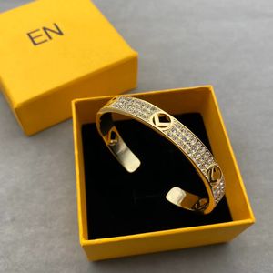 Brand Designer Gold Open bracelet Female triple row diamond High quality titanium steel alloy bracelet Non fading Birthday party wedding jewelry gift
