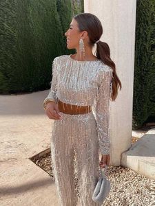 Kvinnors tvådelar byxor clearance Tassel Sequin Women 2 Piece Set Spring Silver Bright Silk O-Neck Crop Topps Wide Leg Pant Female Lady Set T240507