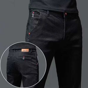 Herr jeans fast färg bomull svart mörkgrå jeans män byxor klassiska smala sträcka avslappnade koreanska mode ungdomar manliga denim byxor y240507