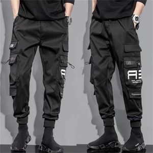 Męskie dżinsy męskie spodnie cargo z wieloma kieszeniami i sznurkiem Outdoor Mens Spods Spodnie Męskie spodnie do joggingu J240507