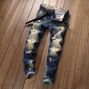 Jeans masculino jeans jeans Design Slim Fit Broken Hole Trend Versátil mendigo alto