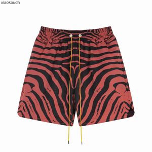 Rhude High end designer shorts for Meichao Zebra Embroidered Letter Short sleeved Shirt Summer Mens and Women Loose Sports Shorts Casual High Street With 1:1 original