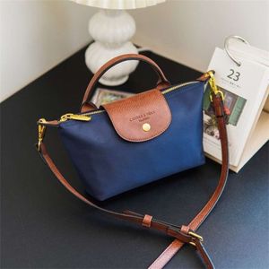 Best Selling Crossbody Bag New 85% Factory Promotion Hong Kong Purchasing Agent Nylon Contrasting Dumpling Small Mommy Fashionable and Versatile Casual Bag