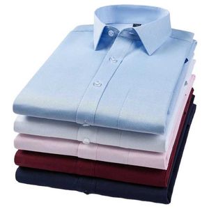 Camisas de vestido masculinas Novo algodão Men clássico Camisa de vestido longo de pocket regular FIL FIT Business Work Office Casual Button Shirts S-8xl D240507