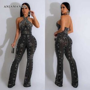 Kvinnors jumpsuits Rompers Elegant Sexy Rhinestone Halter Flare Jumpsuit Womans Clothing Luxury White Black Birthday Outfit Evening Party T240507