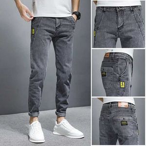 Mäns jeans modeetikett Mens Gray Stretch Jeans Ny Slim Fit Simple Personality Man Clothing Casual Skinny Denim Trousers Y240507