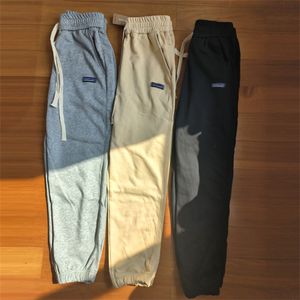 Pantaloni da uomo pantaloni in pile di pile classiche classiche cravatte a colore solido cravatta per cespuli casual pantaloni uomini e donne modelli di coppia