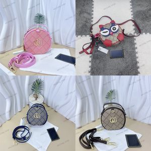 Lüks mini crossbody çanta tasarımcısı çocuklar çocuklar debriyaj çantaları yuvarlak daire küçük omuz çantası marka desen kız kızlar zarf çanta cüzdan cüzdan açık hava