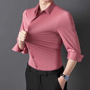 Camicie da uomo da uomo da uomo di alta qualità ad alta elasticità solida elasticità senza soluzione di continuità comode camicie a lunghezza long sling slim business business camicia formale d240507