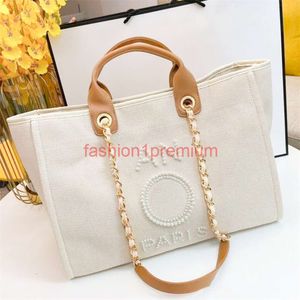 Mode sommaren deauville pärla nylon canvas totes väska kvinnor herr crossbody axel strand designer lyx handväska toppkvalitet stora koppling rese shoppare väskor