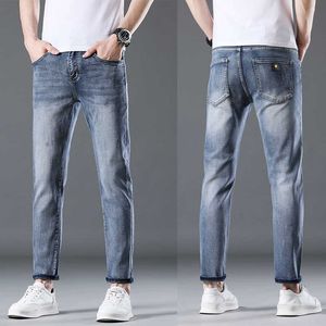 Kvalitet Hög minimalistisk beskuren jeans för herr sommaren smal och trendig koreansk version ljus lyx drapering känsla tvättade mångsidiga avslappnade byxor