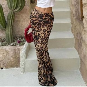 Kjolar leopard tryckt se genom kjolar för kvinnor sexig retro spets 2024 vår unik hög midja höft wrap smal kjolar q240507
