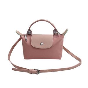 Shop Best Selling Shoulder Bag New 90% Factory Direct Sales Womens Bag New Mini Hand Carrying Crossbody Dumpling Phone Change Makeup Bag