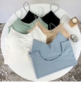 Kvinnors tankar Sexig solid färg Crop Tops Sports Spaghetti Strap Tanke Top Kvinnor Byggt i BH OFF AILDELSELESS OMIGTY CAMISOLE