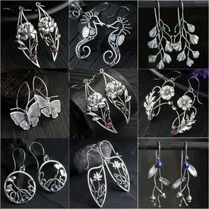 Dangle Chandelier Retro Silver Flower Earrings instnic Metal Round Growd Plants Proforts Plants اطلب من أقراط الخطاف الحجرية XW