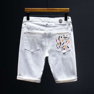 Modekleidung Trendy Marke High-End-Denim-Shorts für Sommer lose sitzende geradlinige Röhre spritzte Tinte Stickerei Elastische vielseitige Shorts Herren Jeans Designs