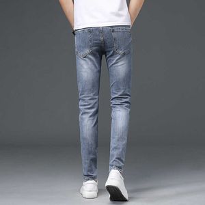 Jeans franska mens höst bekväma high-end mode trendbyxor